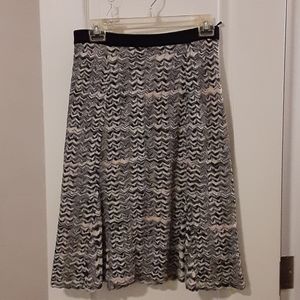Made in Italy skirt with slip built in.